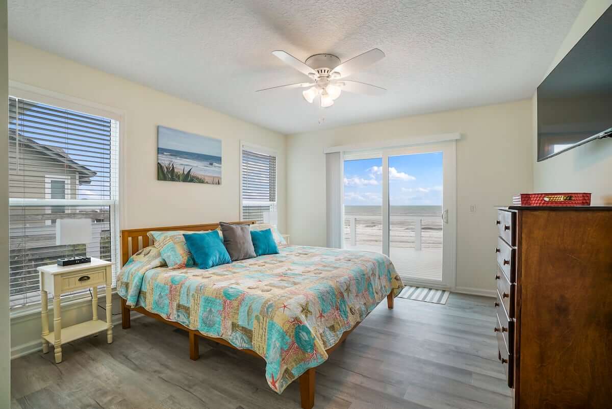 bed room with the view of the beach